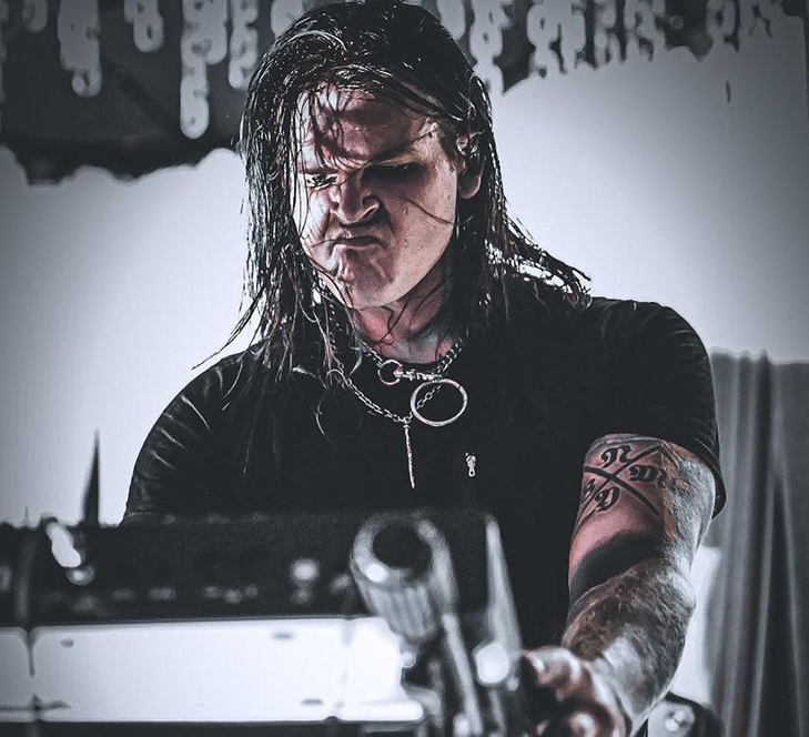 Travis Bacon Performing